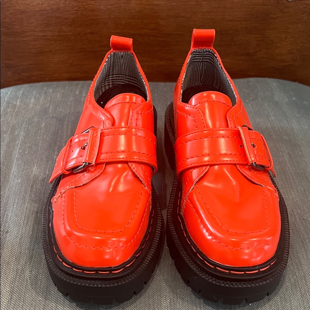 Vibrant orange Buckle Loafers circus ny